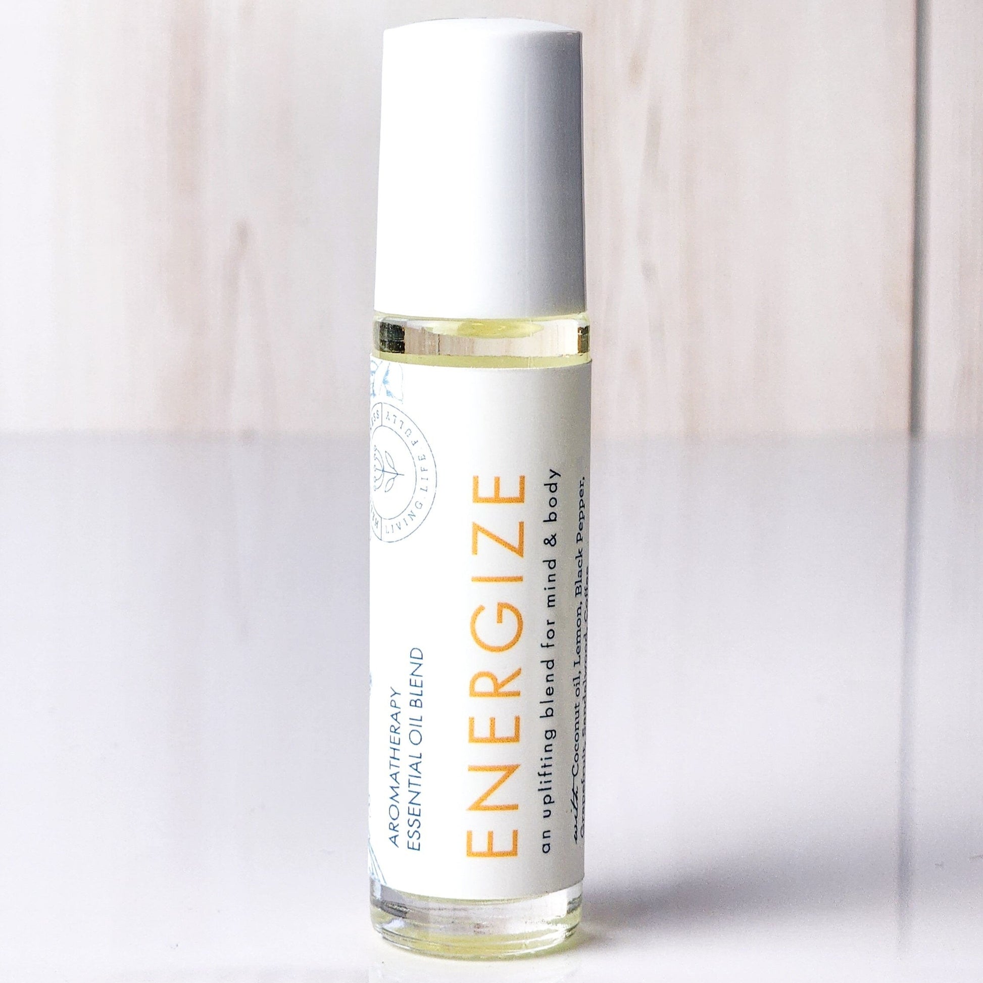 Roll-on bottle labeled 'Energize' for for boost without the caffeine crash