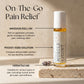 Massage roll-on bottle labeled 'Muscle + Joint' with features highlighted on a neutral background