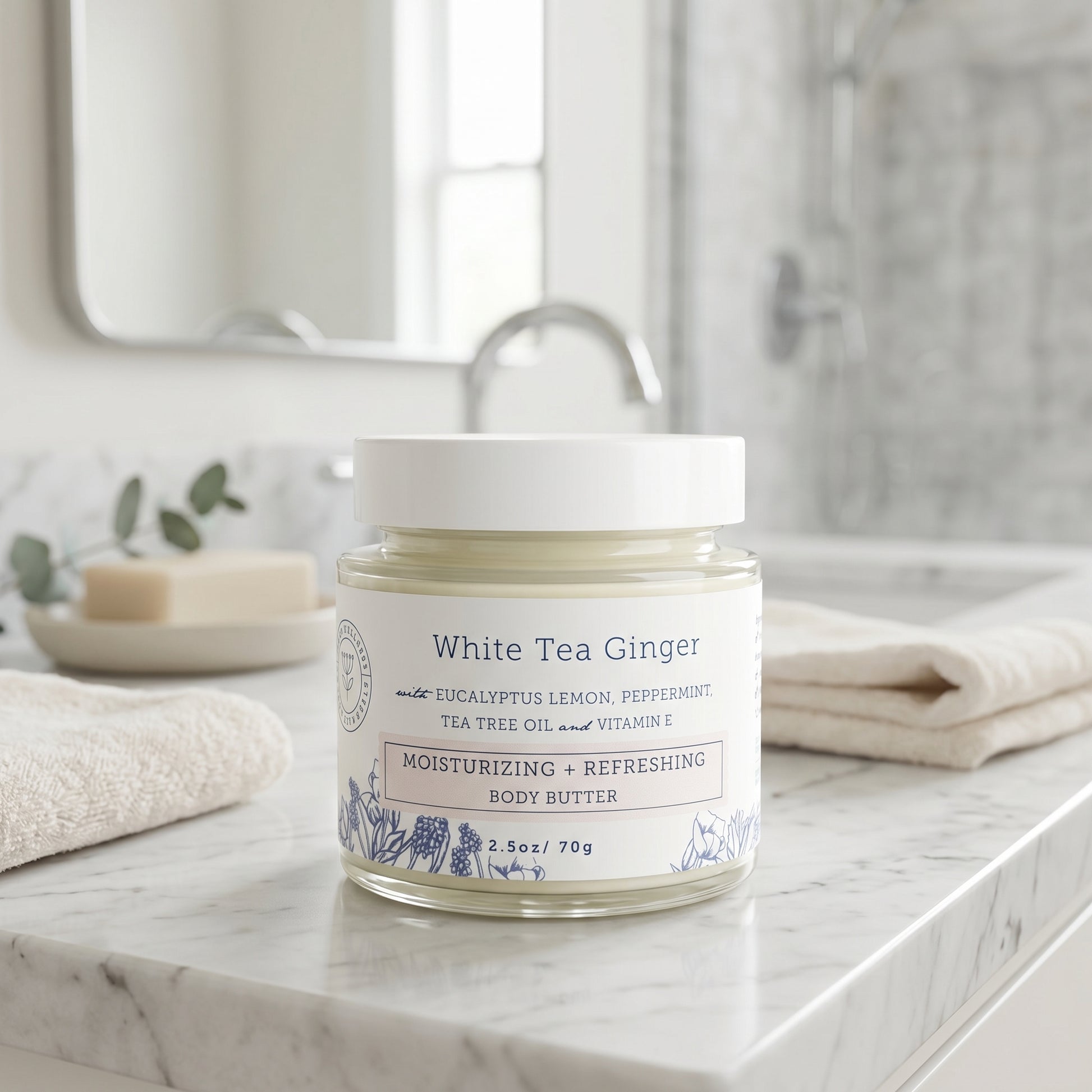 Jar of White Tea Ginger body butter on a bathroom counter. Eczema relief. Hello wellness