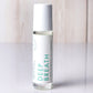 Hello Wellness Deep Breath aromatherapy essential oil roll-on in a clear glass bottle with a white cap, a clarifying sinus blend.