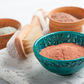 Bowls of Nourishing Pink Clay Face Mask. Gently detoxifies, clears pores & enhances the complexion. Moisturizes dry skin.